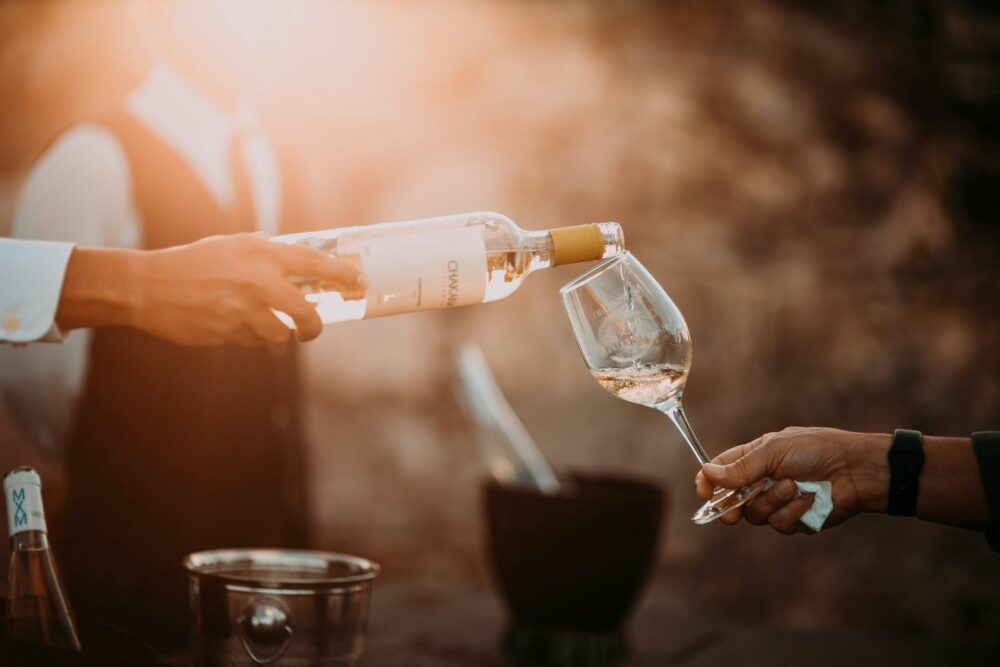 Pouring Chanel Rose into a Luxury Wineglass